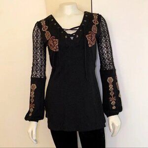 Boho V-Neck Blouse with grommet neck line, lace sleeves, and embroidery